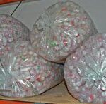 Clear plastic bags filled with wrapped candies